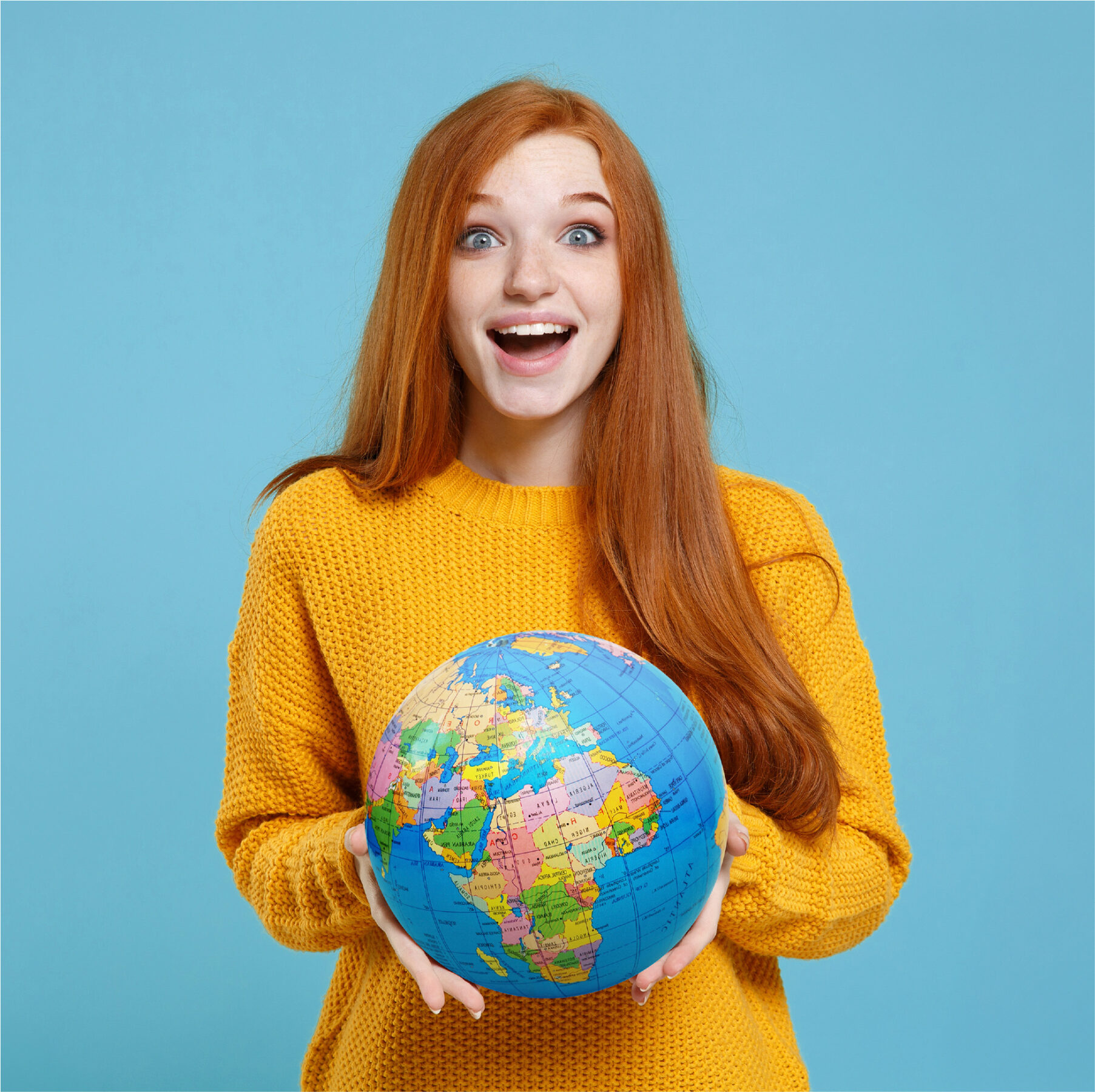 Employee holding a globe symbolising remote work